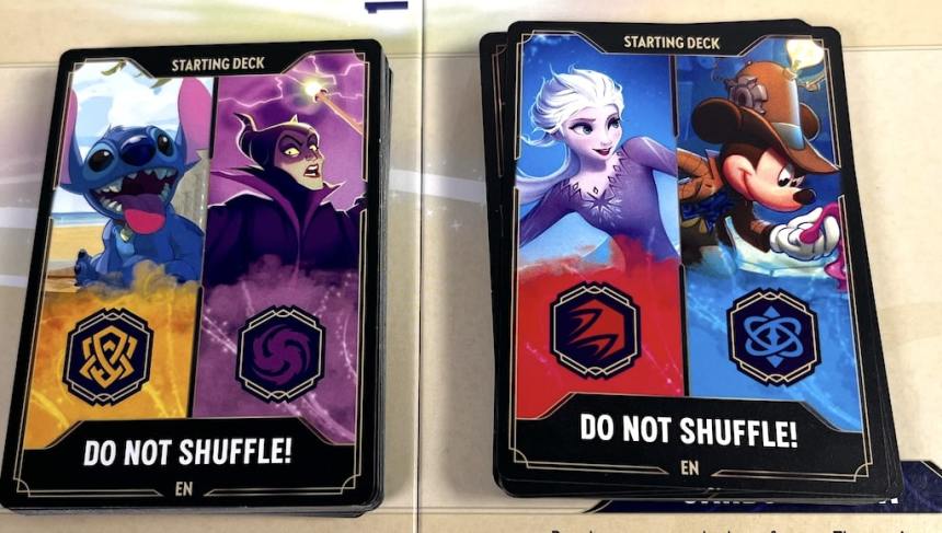 Disney Lorcana Gateway starting decks. Each is topped with a card that says DO NOT SHUFFLE!