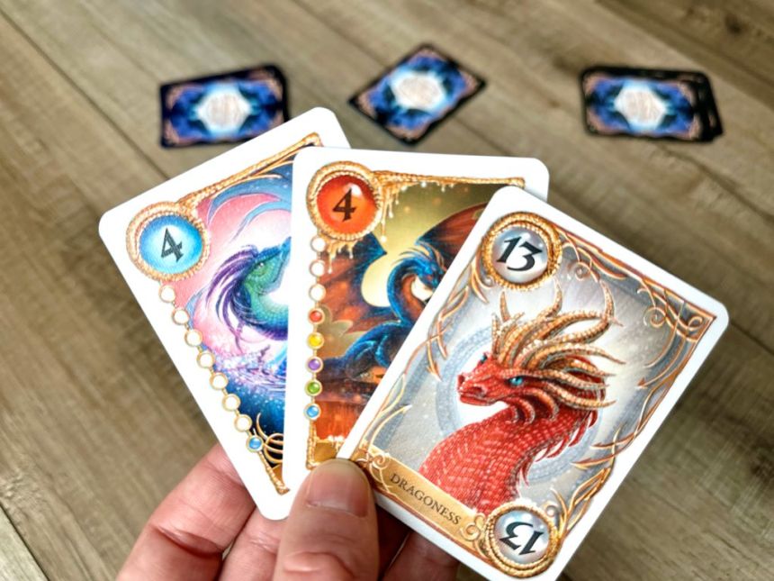 a hand of cards in Reign of Dragoness
