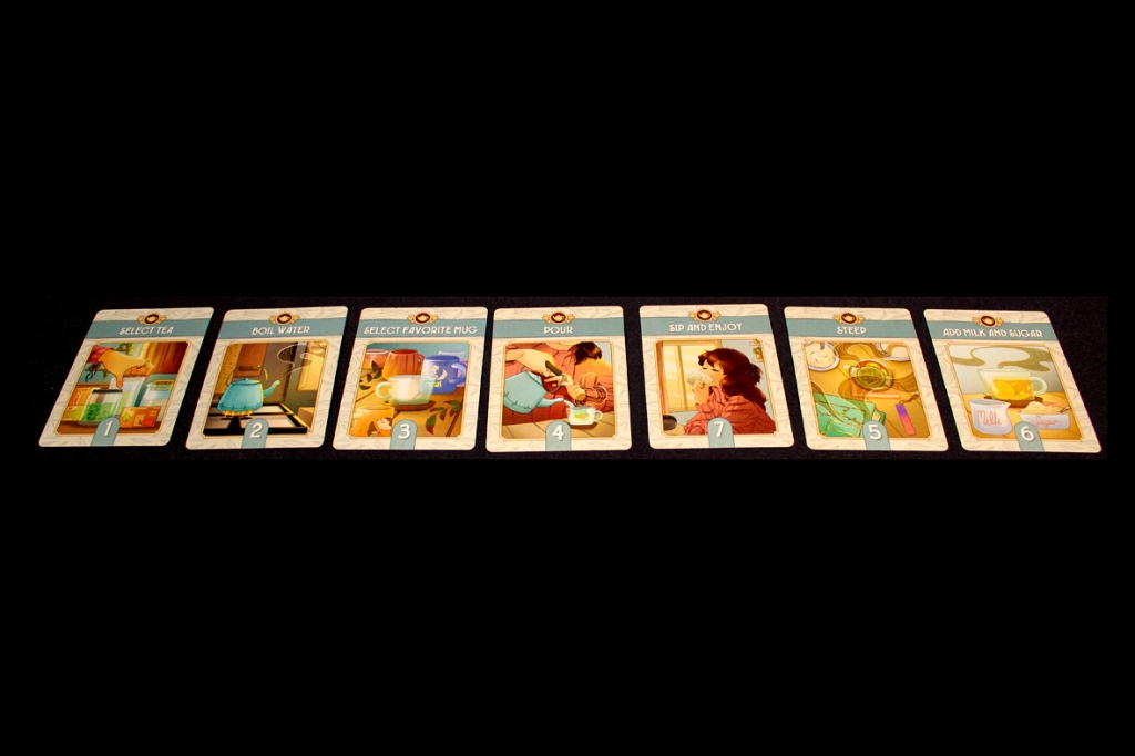 A row of tea preparation cards from the game A Nice Cuppa, featuring illustrations for selecting tea, boiling water, choosing a mug, steeping tea, adding milk and sugar, and enjoying tea.